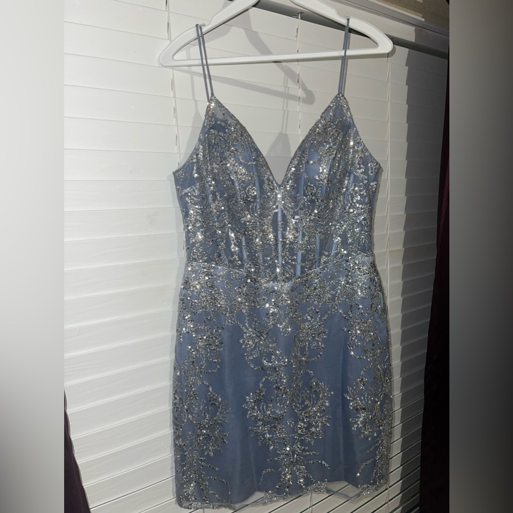 Selling my daughter's homecoming Dress. Used once for 2 hrs. Literally new.